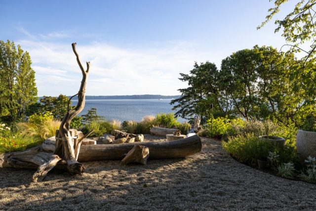 drift wood beach fire pit with pea gravel