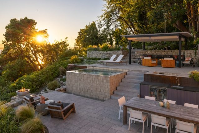complete outdoor oasis with hot tub pergola cold plunge outdoor kitchen